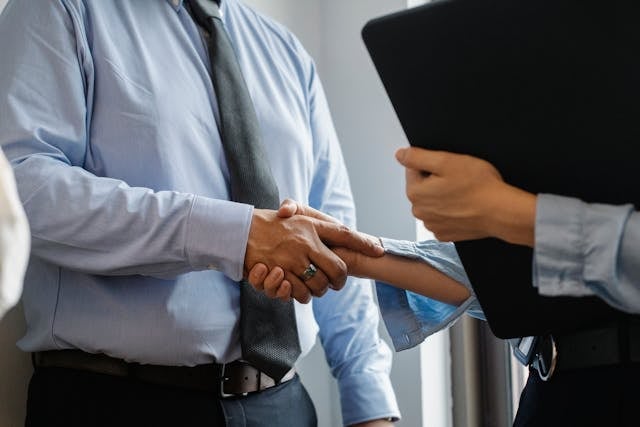 Two people shaking hands 